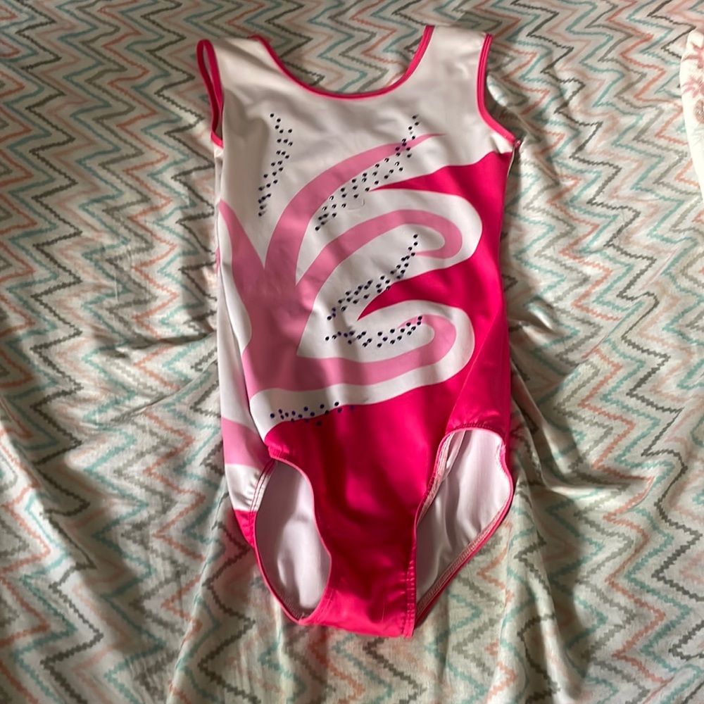 pink and white gymnastics leotard